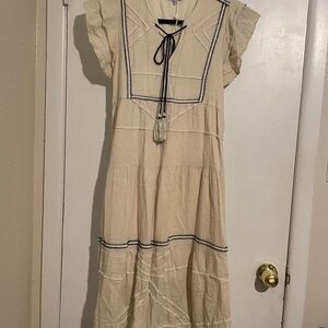 Chic Cream Midi Dress with Black Trim